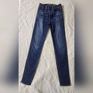 high rise,super stretch American Eagle jegging dark blue jeans  size 00